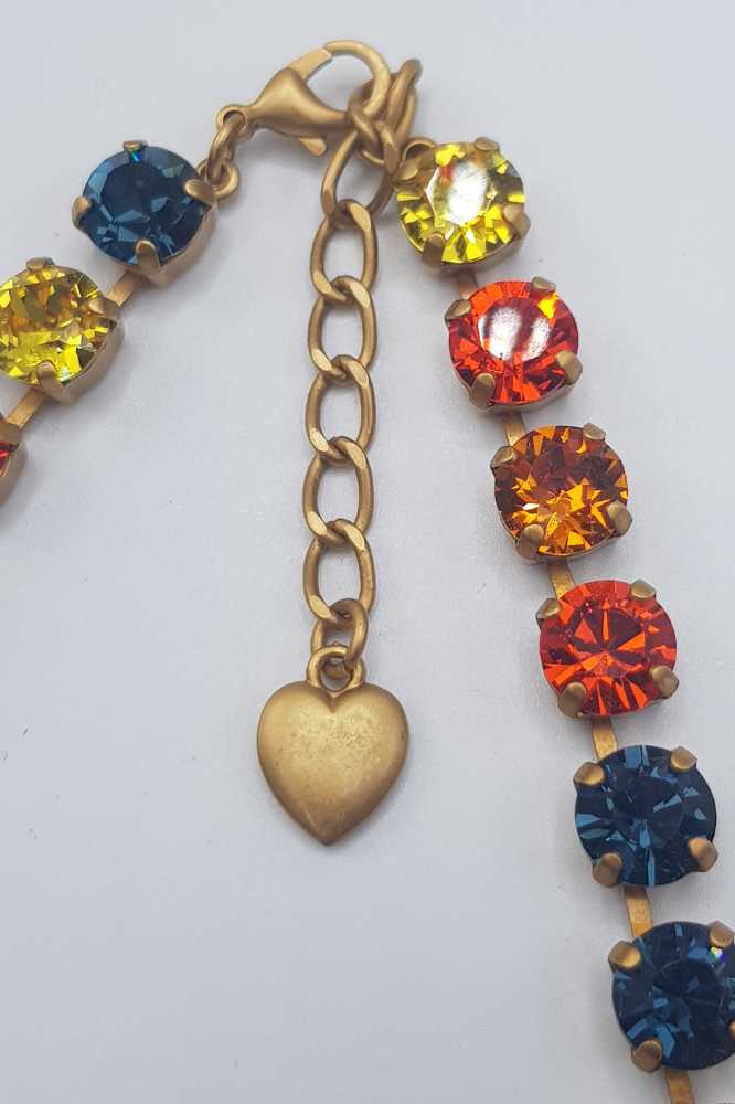 Nell Bijoux Luna Matte Gold L003 - La Vie en Rose Damesmode (6) Details Luna Matte Gold L103 Orange and Gold: Lengte: ca. 49 cm, inclusief sluiting en het verlengstukje Sluiting: Lobster sluiting Kristallen: Swarovski Metaalkleur: Matte Gold Nikkelvrij: Ja SKU/ProductID: L103 Maat model: Eén maat, ca. 49 cm