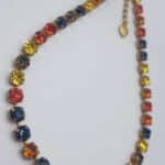 Nell Bijoux Luna Matte Gold L003 - La Vie en Rose Damesmode (6) Details Luna Matte Gold L103 Orange and Gold: Lengte: ca. 49 cm, inclusief sluiting en het verlengstukje Sluiting: Lobster sluiting Kristallen: Swarovski Metaalkleur: Matte Gold Nikkelvrij: Ja SKU/ProductID: L103 Maat model: Eén maat, ca. 49 cm