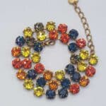 Nell Bijoux Luna Matte Gold L003 - La Vie en Rose Damesmode (6) Details Luna Matte Gold L103 Orange and Gold: Lengte: ca. 49 cm, inclusief sluiting en het verlengstukje Sluiting: Lobster sluiting Kristallen: Swarovski Metaalkleur: Matte Gold Nikkelvrij: Ja SKU/ProductID: L103 Maat model: Eén maat, ca. 49 cm