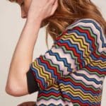 Stofsamenstelling: 100% organic cotton Stofsamenstelling voering: Wasinstructies: Wash inside out - 30° Delicate wash. Do not bleach. Iron at a low temperature (*). Suitable for dry cleaning. Do not trumble dry. Dry flat.