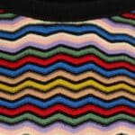 Stofsamenstelling: 100% organic cotton Stofsamenstelling voering: Wasinstructies: Wash inside out - 30° Delicate wash. Do not bleach. Iron at a low temperature (*). Suitable for dry cleaning. Do not trumble dry. Dry flat.