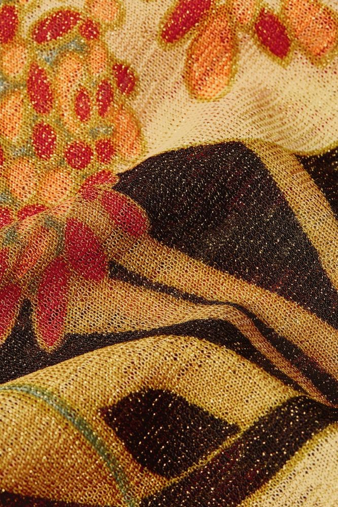 Mary Jumpsuit Dazz van King Louie – sprankelende jumpsuit met bloemenprint, overslagtop en cap sleeves. Comfortabel stretchmateriaal. Nu op lavieonline.nl.